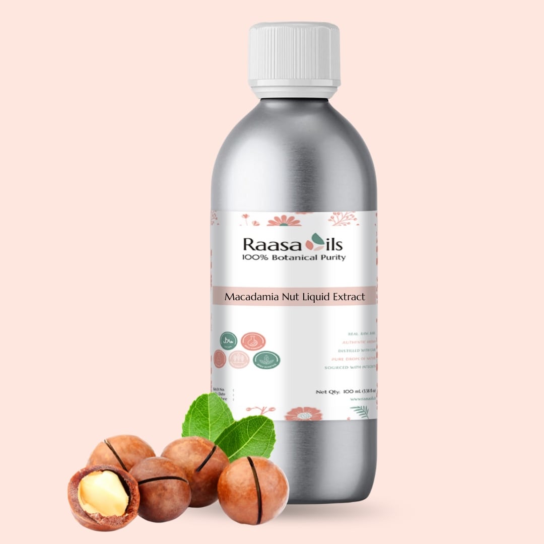 Bottle of Raasa Oils Macadamia Nut Liquid Extract with macadamia nuts and leaves on a light pink background