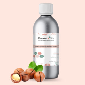 Bottle of Raasa Oils Macadamia Nut Liquid Extract with macadamia nuts and leaves on a light pink background
