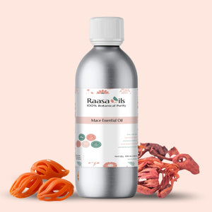 Bottle of Raasa Oils Mace Essential Oil with mace seeds on a beige background