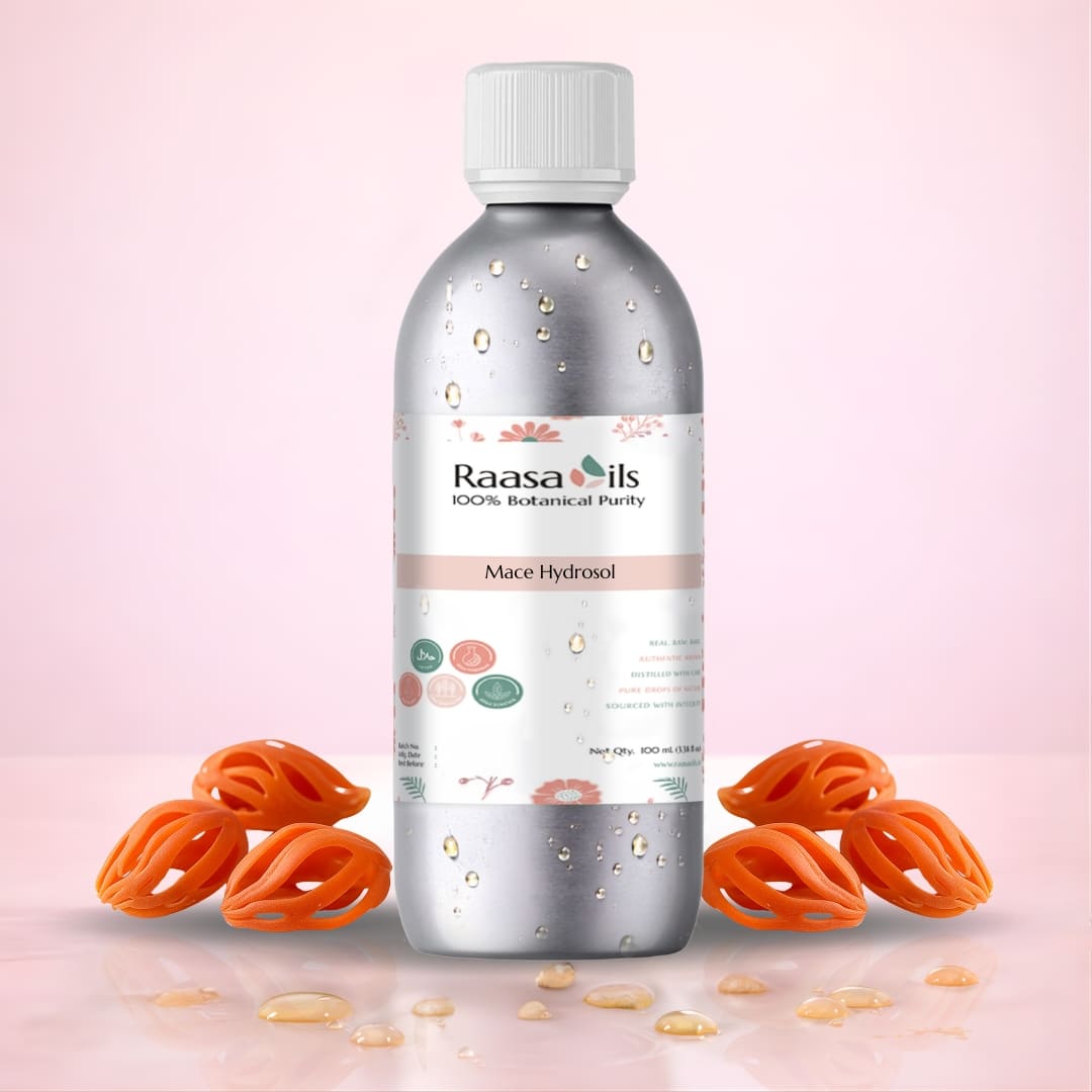Bottle of Raasa Oils Mace Hydrofol with mace seeds on a pink background