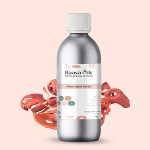 Bottle of Raasa Oils Mace Liquid Extract with mace seeds on a light pink background