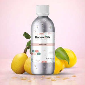 Raasa Oils bottle with marula oil and fruits on a pink background