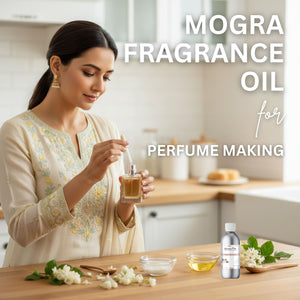 Woman using Mogra fragrance oil for perfume making in a kitchen setting