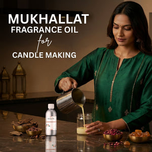 Woman pouring a liquid into a jar with text about Mukhallat fragrance oil for candle making.