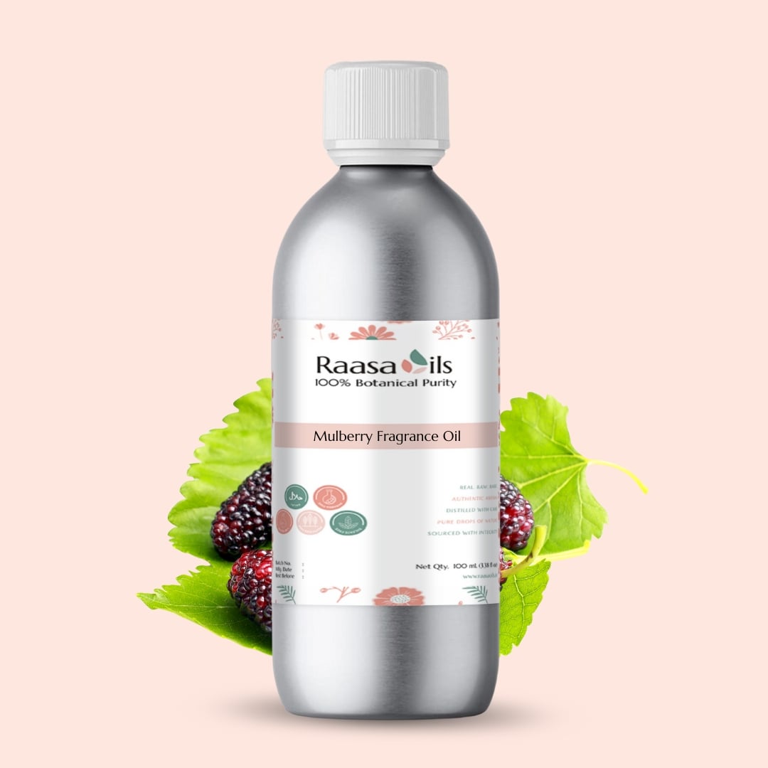 Bottle of Raasa Oils Mulberry Fragrance Oil with mulberry fruits and leaves on a light pink background