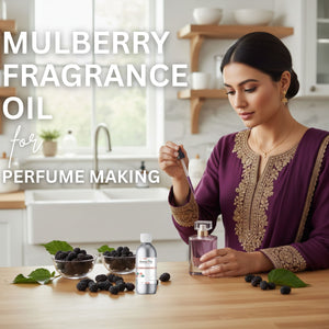 Woman in a kitchen setting with ingredients and a bottle labeled 'Mulberry Fragrance Oil' for perfume making.