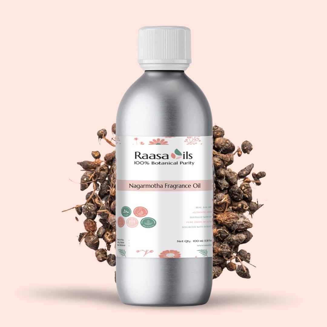 Raasa Oils Nagarmotha Fragrance Oil bottle with dried rose hips on a light pink background