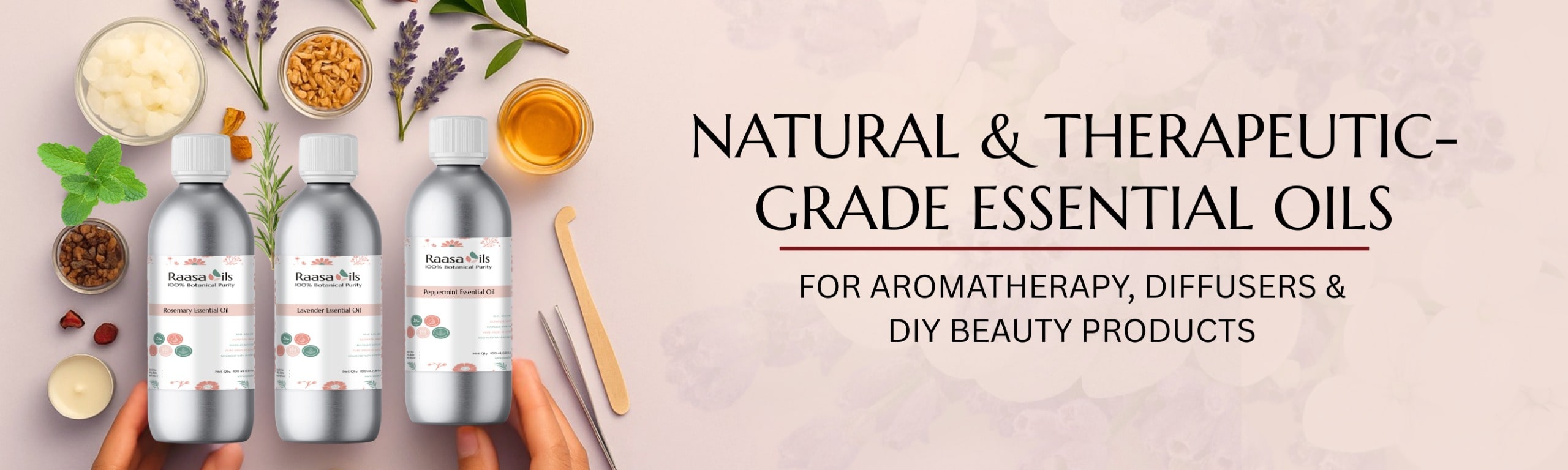 Essential oil bottles with herbs and a honeycomb on a pink background, promoting natural and therapeutic-grade essential oils.