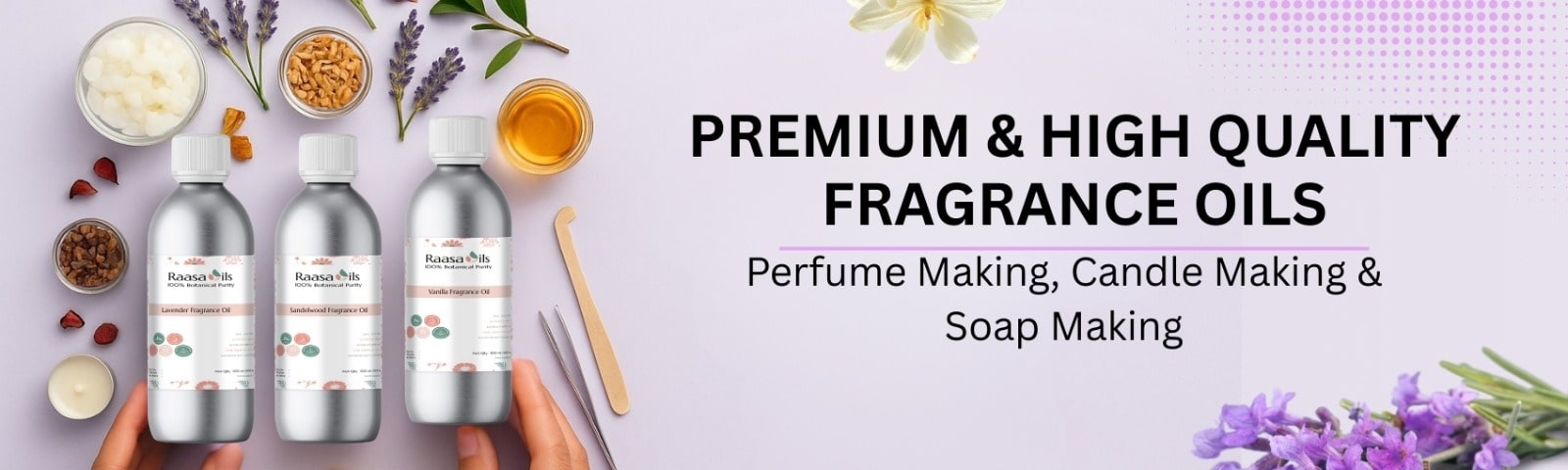 Bottles of premium fragrance oils with decorative elements on a light purple background