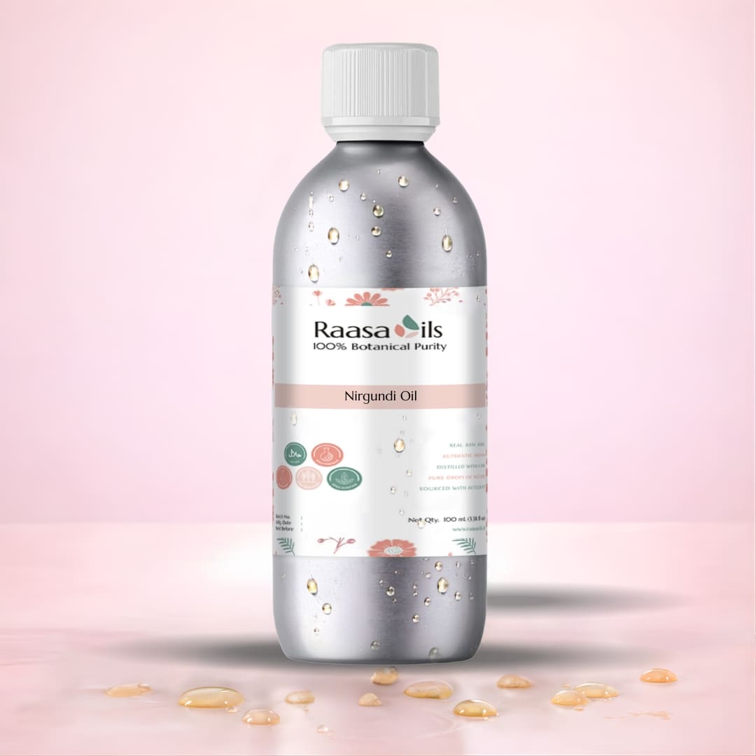 Bottle of Raasa Oils Nirgundi Oil on a pink background