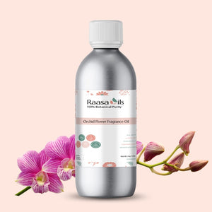 Bottle of Raasa Oils Orchid Flower Fragrance Oil with orchids on a pink background