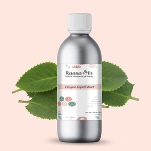 Bottle of Raasa Oils Oregano Liquid Extract with green leaves on a light pink background