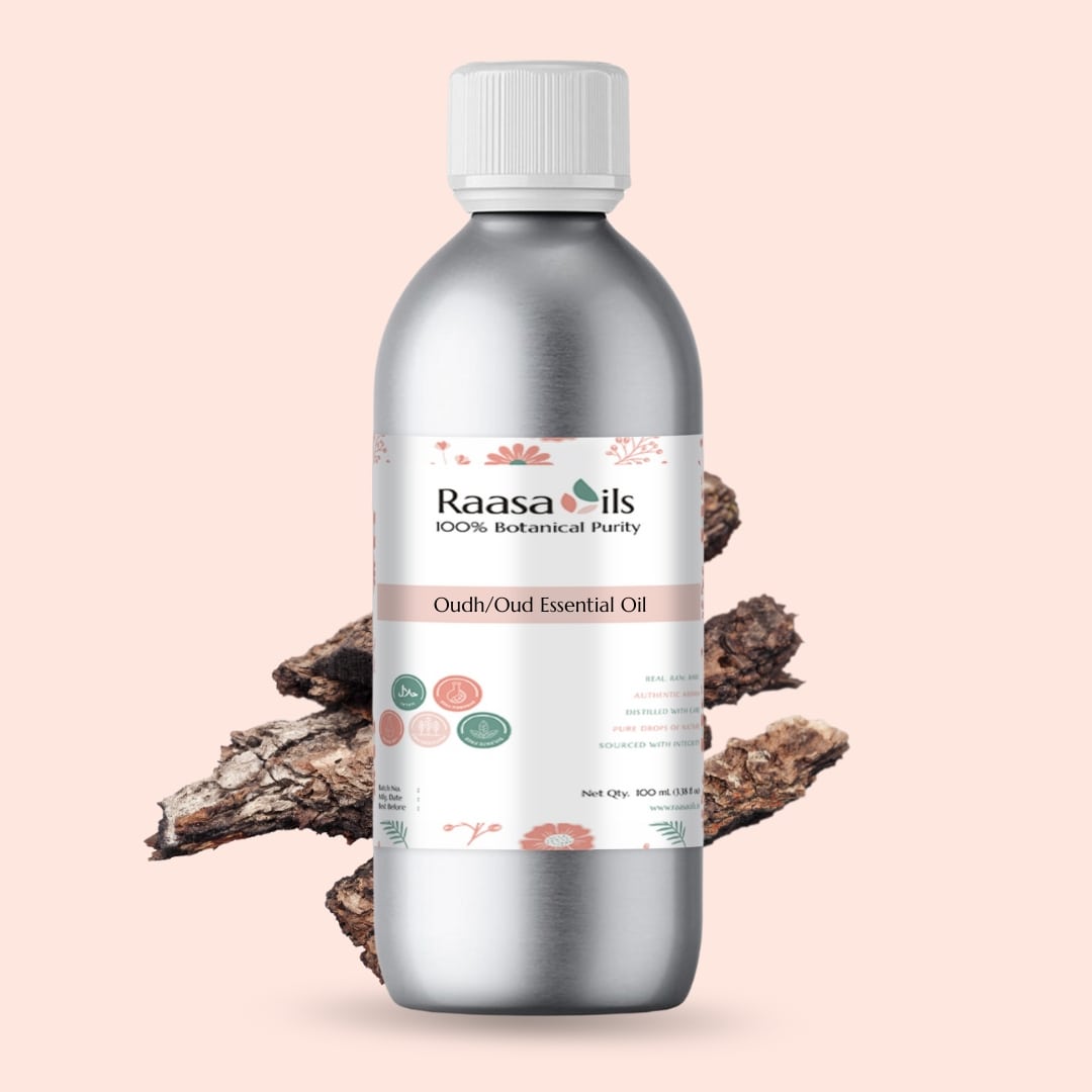 Bottle of Raasa Oils Oudh Essential Oil on a beige background