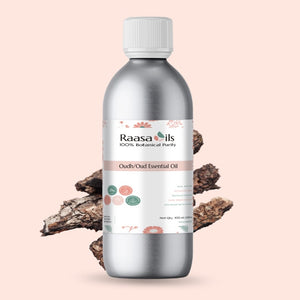 Bottle of Raasa Oils Oudh Essential Oil on a beige background