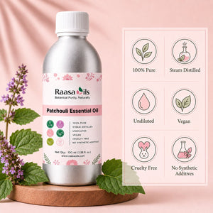 A bottle of Raasa oils Patchouli Essential Oil oil on a wooden tray, surrounded by fresh patchouli leaves and purple flowers, with a feature infographic on a soft pink background.