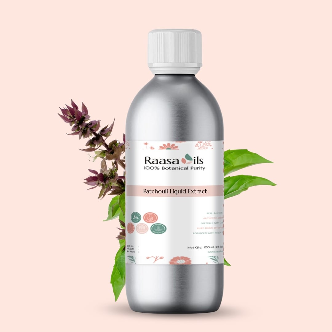 Bottle of Raasa Oils Patchouli Liquid Extract with botanical elements on a light pink background