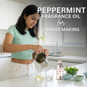 Woman in a kitchen preparing peppermint fragrance oil for candle making.