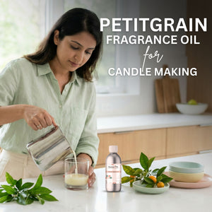 Woman pouring liquid into a glass with Petitgrain fragrance oil for candle making, surrounded by natural elements.