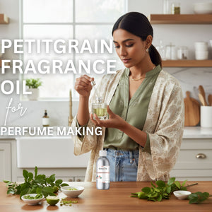 Woman holding a bottle of petitgrain fragrance oil in a kitchen setting with text overlay.