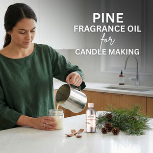 Woman pouring liquid into a jar with pine fragrance oil and candles on a kitchen counter.