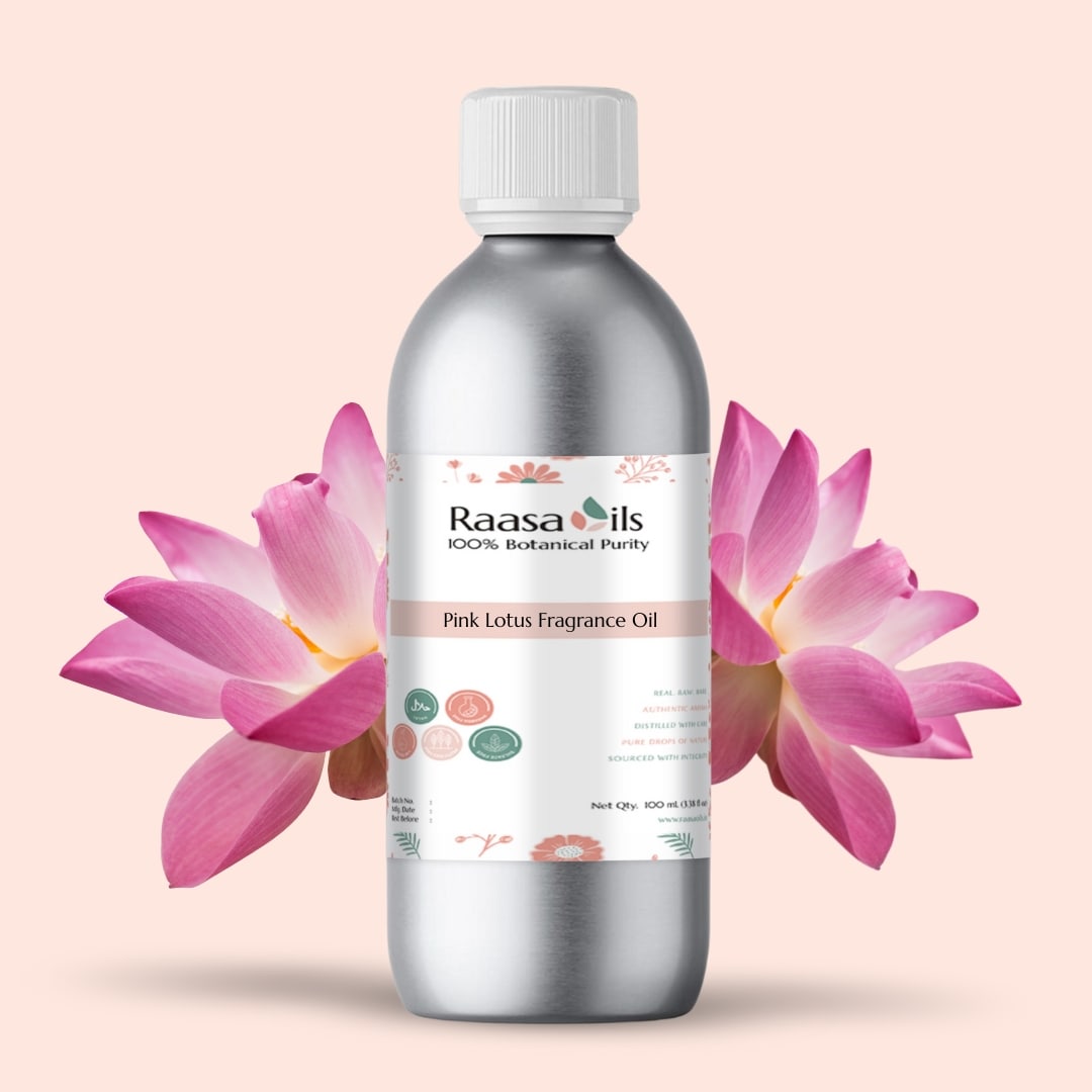Bottle of Raasa Oils Pink Lotus Fragrance Oil with pink lotus flowers on a light pink background