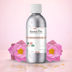 Raasa Oils Pink Lotus Fragrance Oil bottle with pink lotus flowers on a pink background