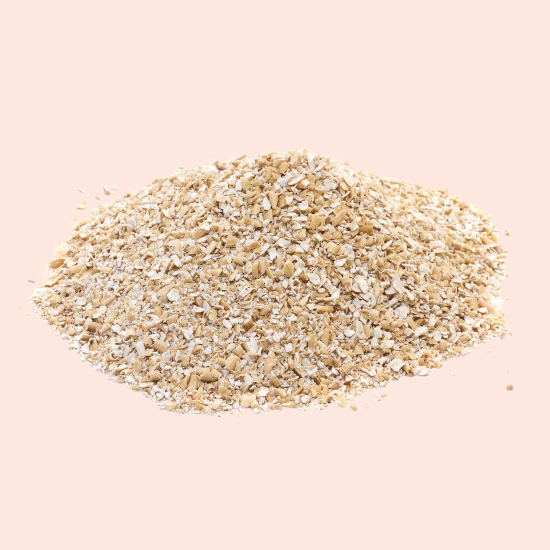 Heap of light brown sand or gravel on a beige background