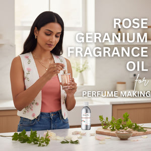 Woman holding a bottle of rose geranium fragrance oil with text overlay in a kitchen setting.