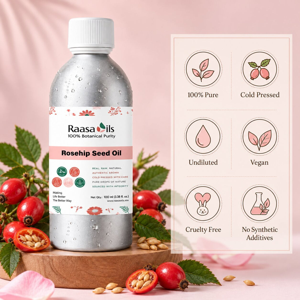 A bottle of Raasa Oils Rosehip Seed Oil stands on a wooden board with rosehips, seeds, and green leaves around it. A pink informational panel on the right lists product benefits such as 100% pure, cold pressed, undiluted, vegan, cruelty free, and no synthetic additives.
