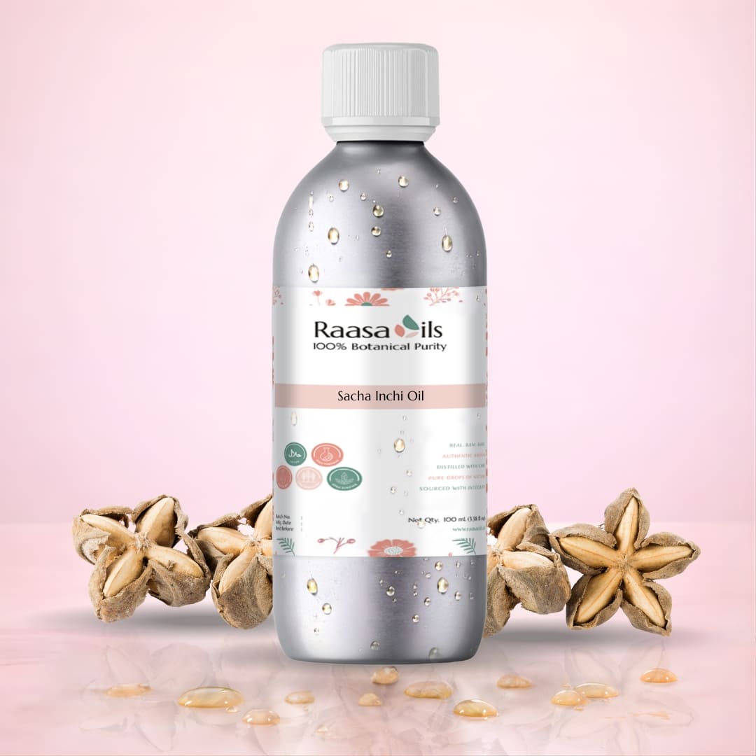 Raasa Oils Sacha Inchi Oil bottle with seeds on a pink background