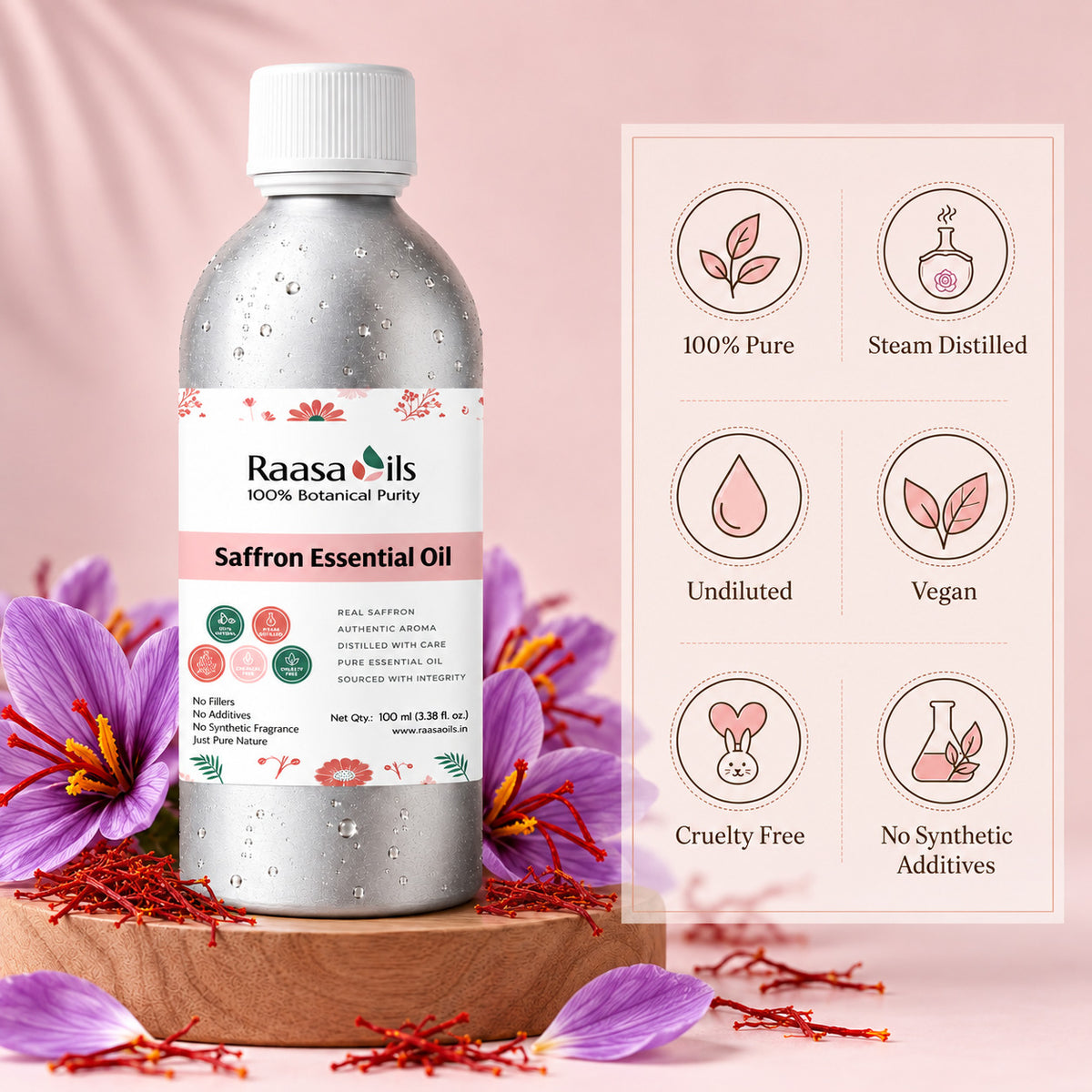 A bottle of Raasa Oils Saffron Essential Oil stands on a wooden tray surrounded by purple saffron flowers and red saffron threads, with a pink informational panel showing product benefits beside it.