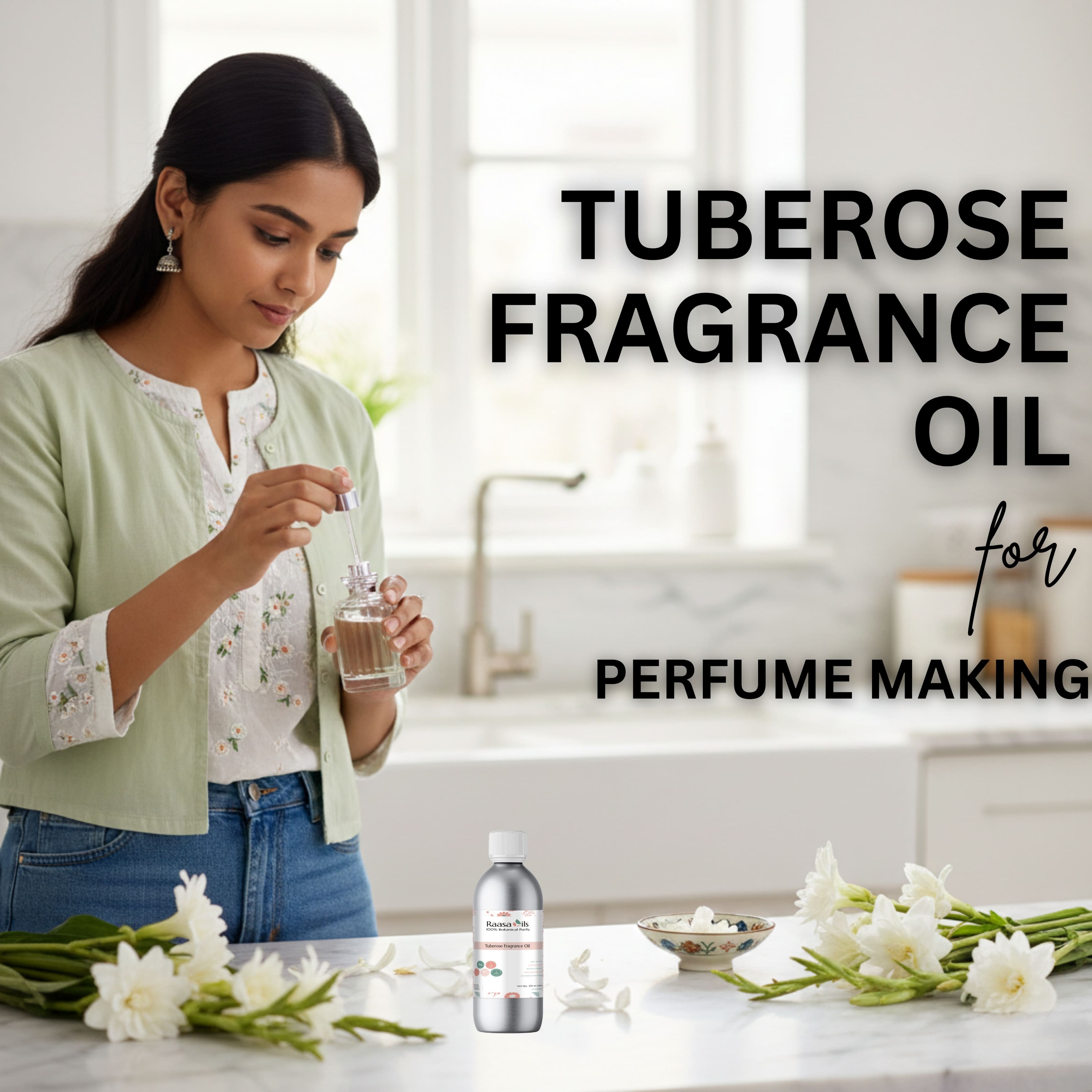 Woman holding a bottle of tuberose fragrance oil with flowers on a table.