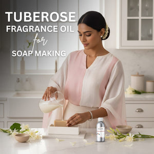 Woman pouring a liquid into soap bars with tuberose fragrance oil text overlay