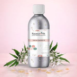Raasa Oils Valerian Essential Oil bottle with flowers on a pink background