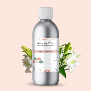 Silver bottle of Raasa Oils White Lily Hydrosol with floral elements on a light pink background