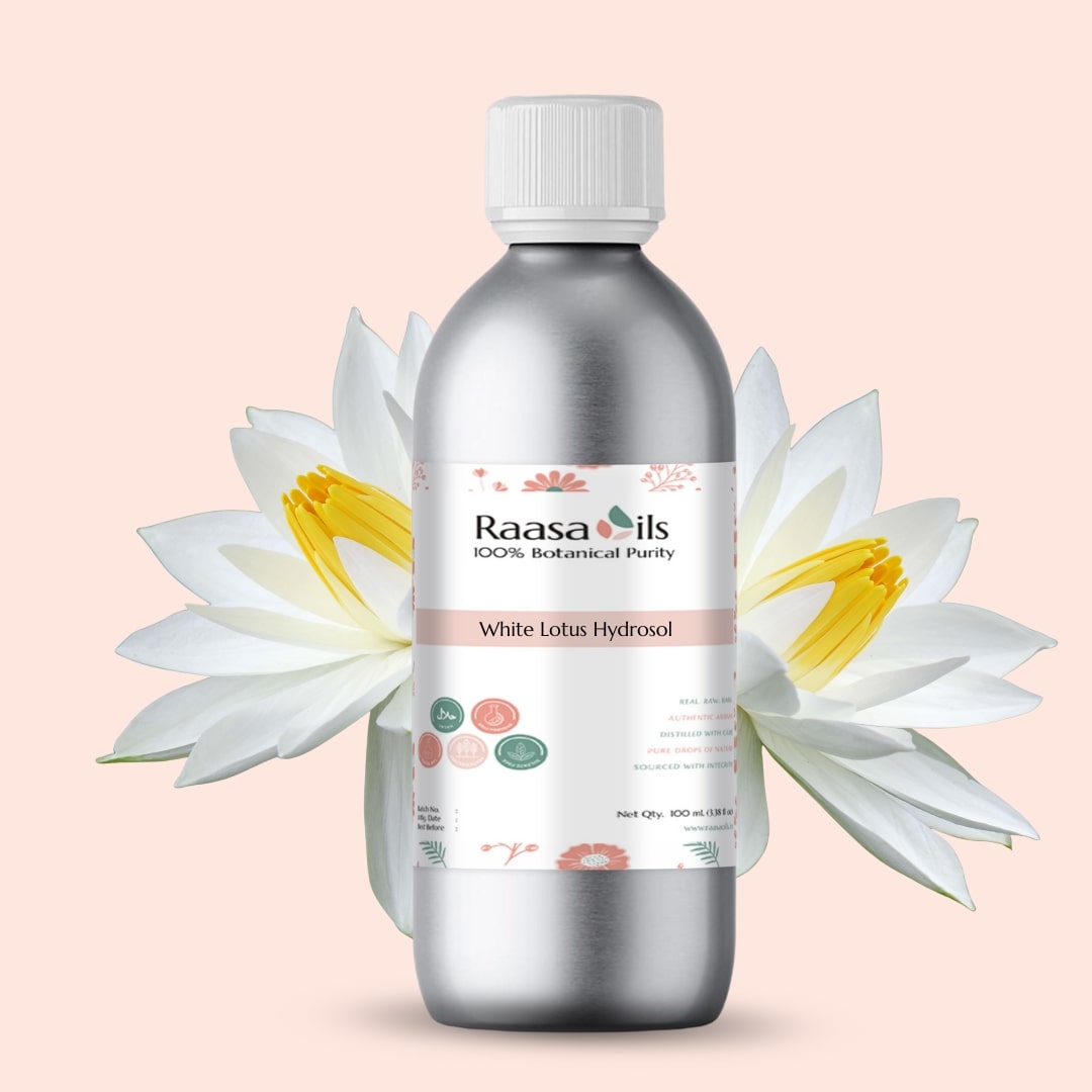 Bottle of Raasa Oils White Lotus Hydrosol with white lotus flowers on a light pink background